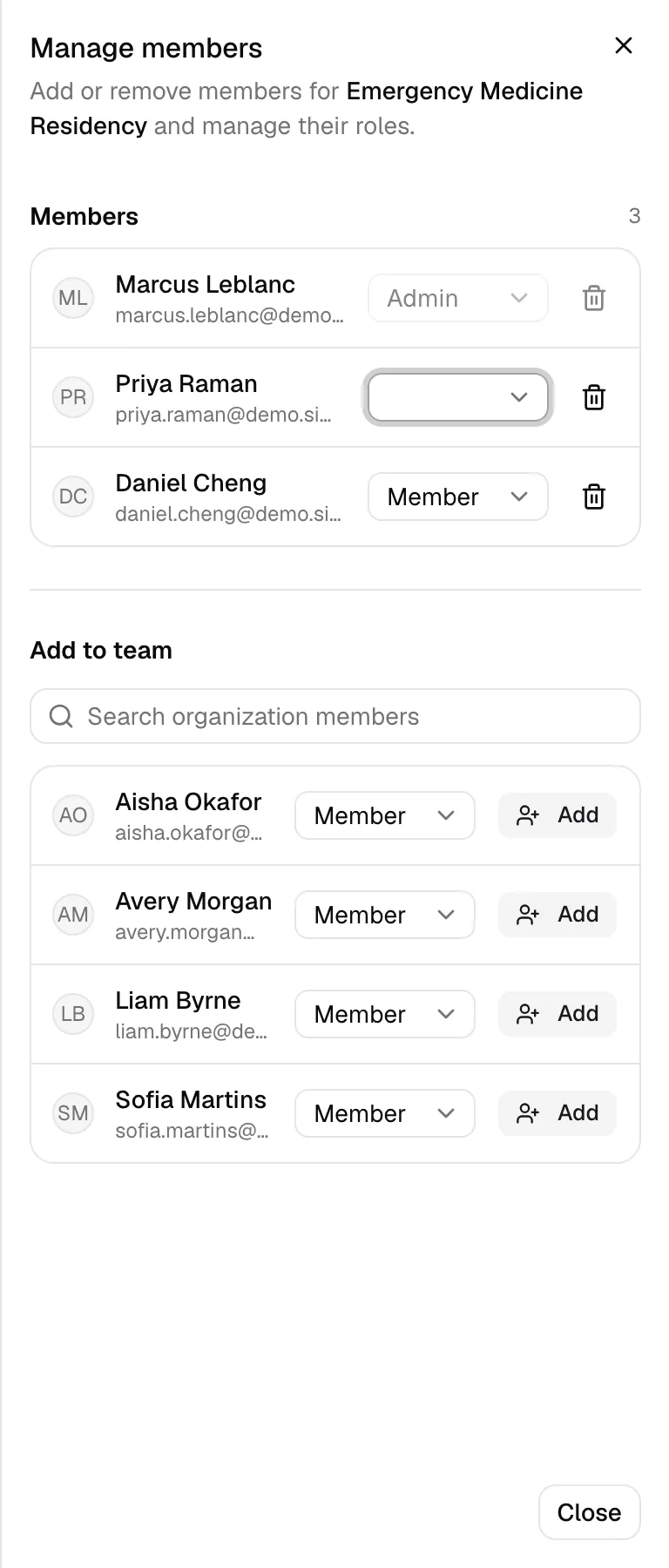 The Manage members dialog, listing the team’s members and their roles above a search for organization members to add